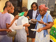 Slide Show3.5_Orphanage Children with AT and Mma Essien Serving Food.jpg