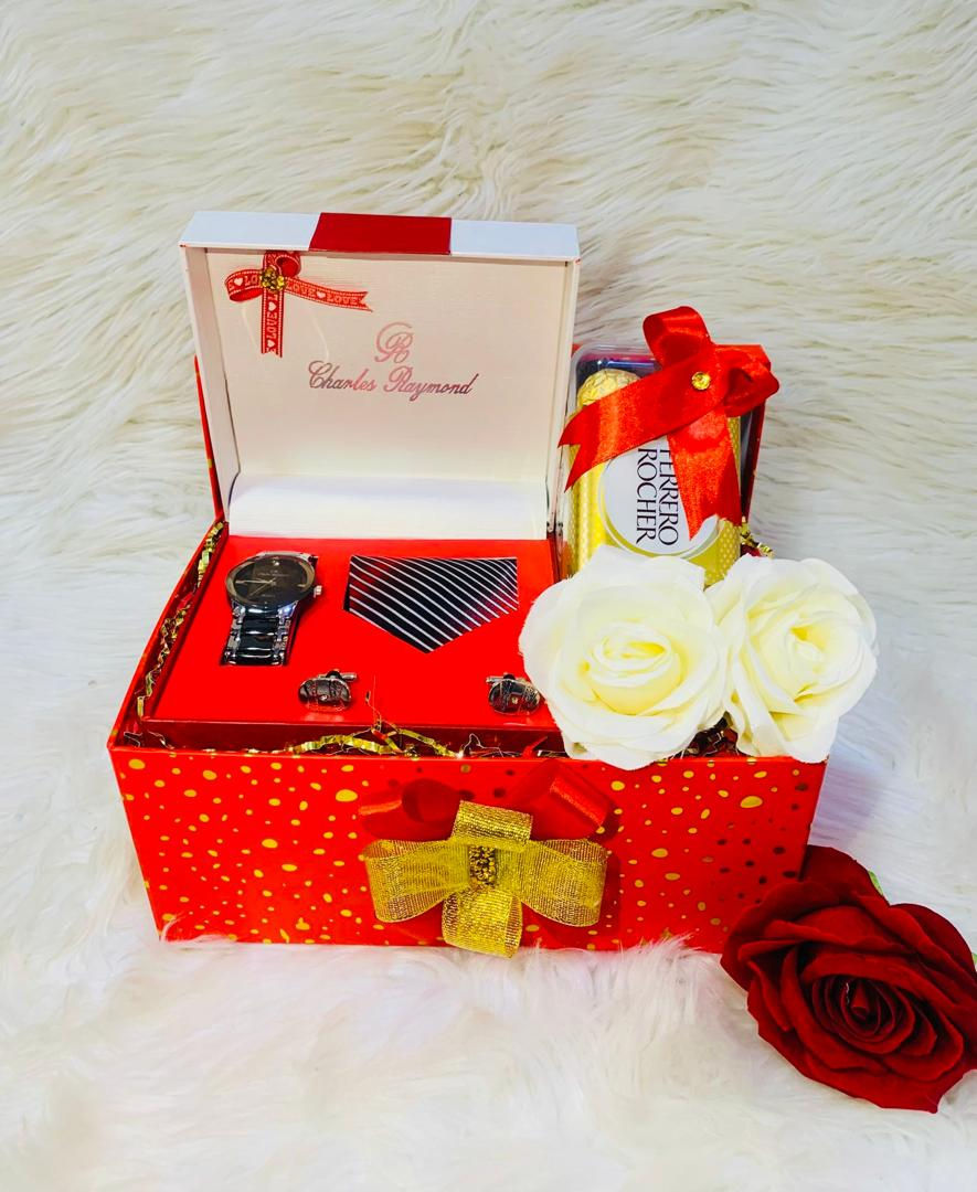 Watch, Tie, Cufflinks Set and Pack of Ferrero Chocolates. 
