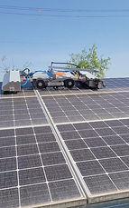 Automatic solar panel cleaner