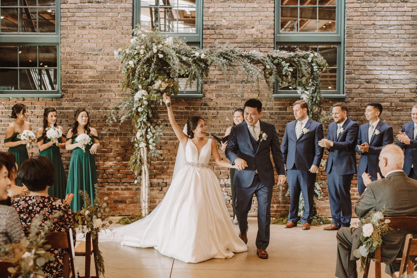 Baltimore wedding venue interior decorated for a reception with warm lighting and floral arrangements