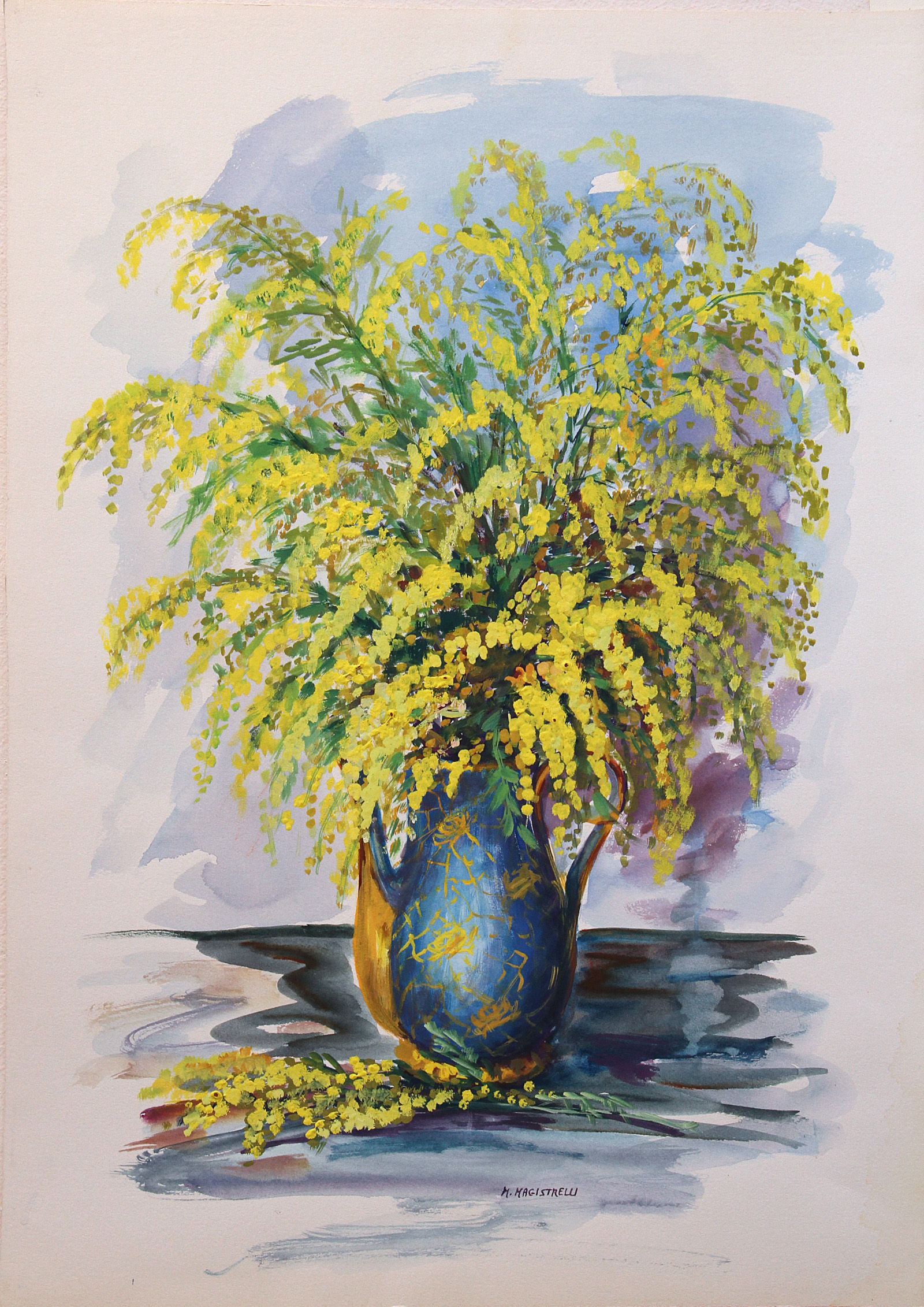 Mimosas in blue and gold vase