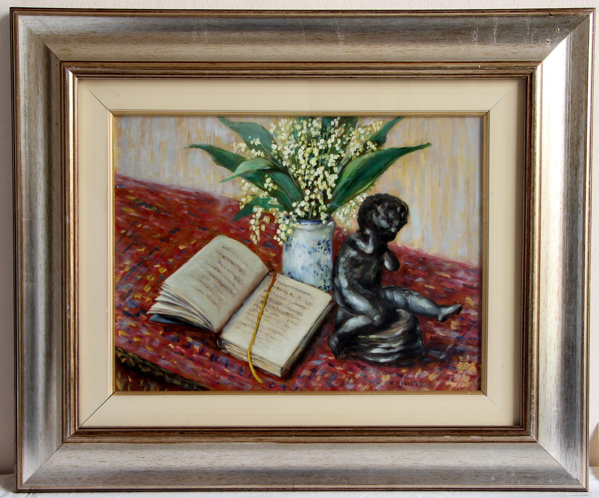 Putto lilies of the valley and book