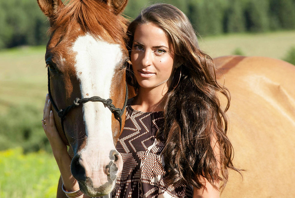 Modelling alongside a beautiful horse, this outfit features rose-gold accessories and tribal print matching separates from Le Chateau.