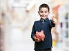 boy-with-thumb-up-piggy-bank.jpg