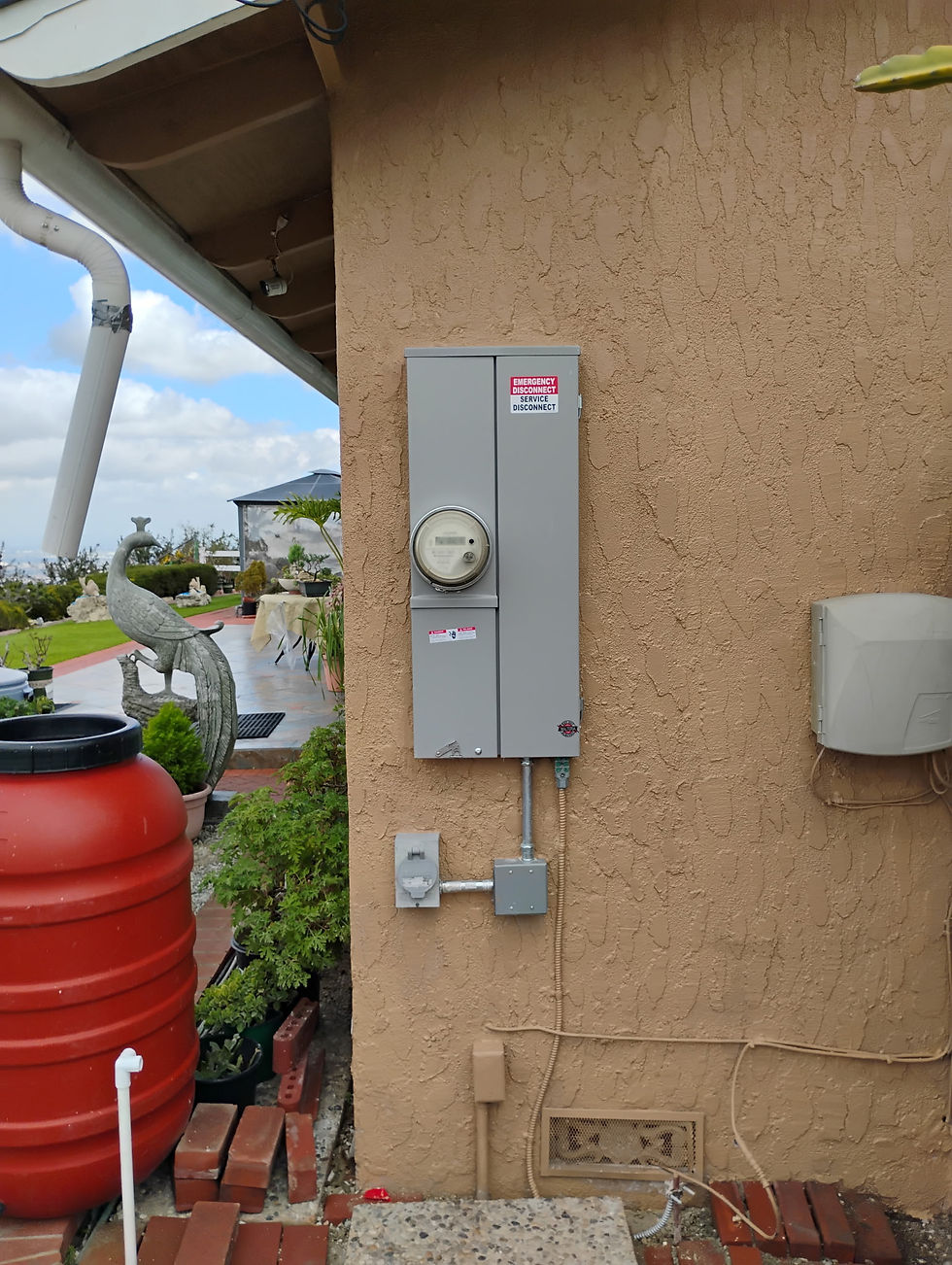 High angle view of electrician planning electrical work with blueprints