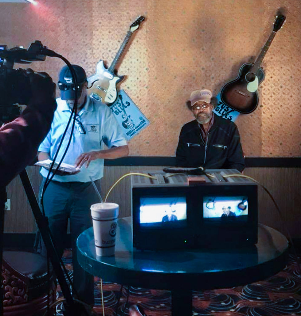 R.L. getting prepped for Charles Mitchell interview (8/1/2018)