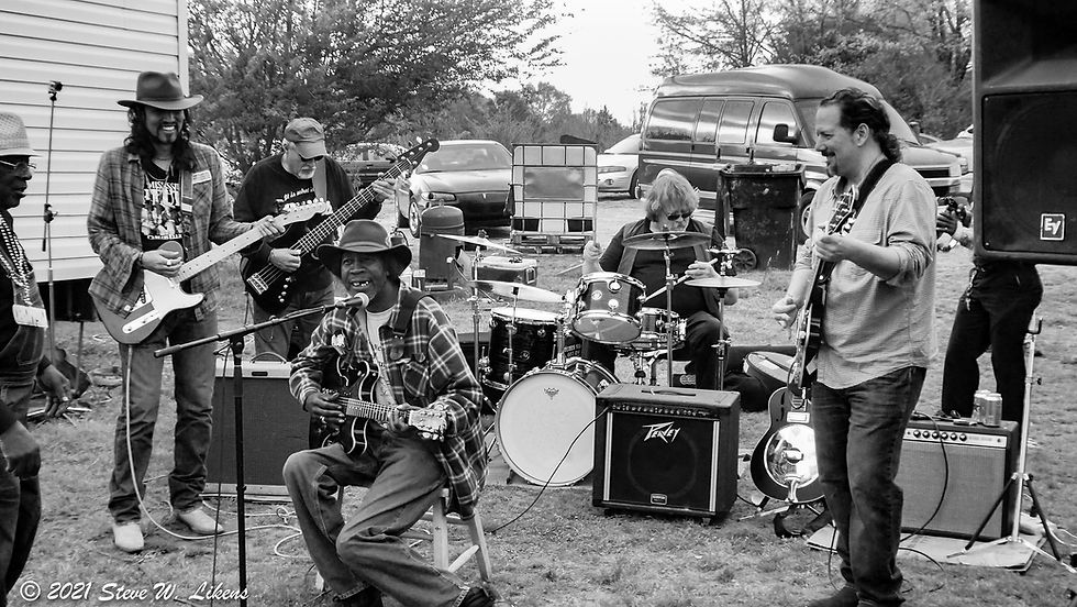 R.L. with Carlos Elliot & The Cornlickers, Little Joe Ayers (far left), Willie Miles (far right) - Como 4/10/2015. This photo was used for the inside fold of the Raise the Fire America CD cover.