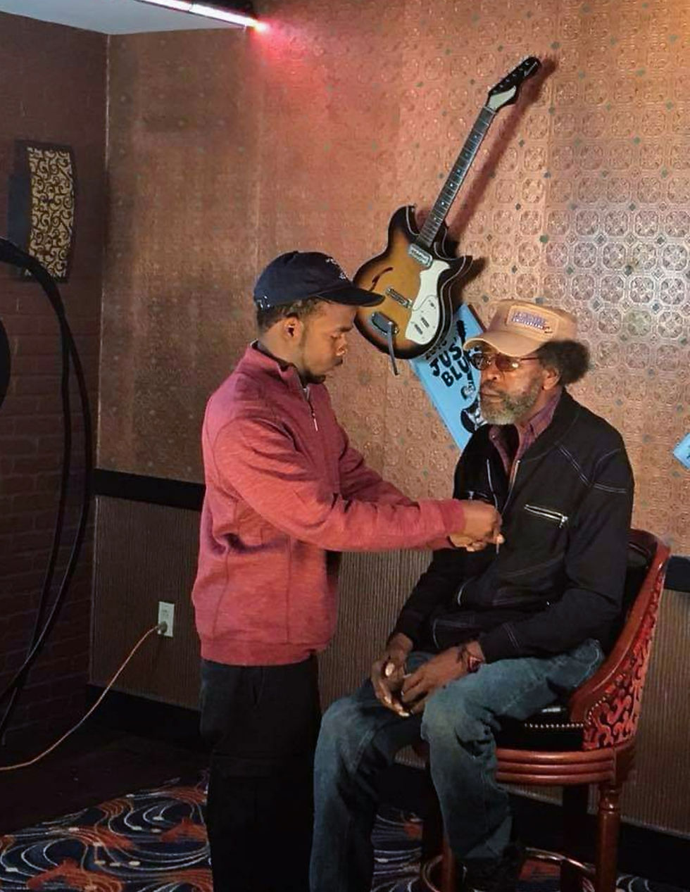 R.L. getting prepped for Charles Mitchell interview (8/1/2018)