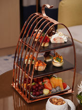 Delicate pastries and fresh tea served in Dubai hotel restaurant.