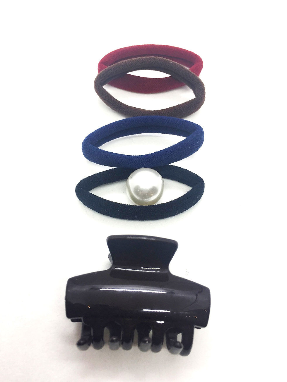 Thumbnail: Ensemble d’élastiques et pince à cheveux.