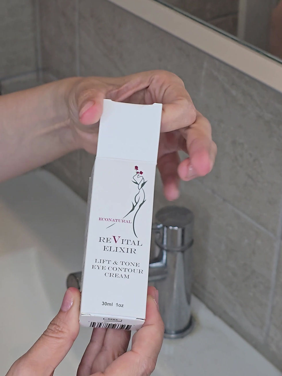 Миниатюра: Tall, cylindrical opaque white airless-pump bottle labeled ‘Lift & Tone Eye Contour Cream 30 ml / 1 oz