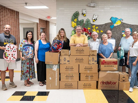 United Way’s Stuff the Bus Provides Local Students with School Supplies for the 14th Year