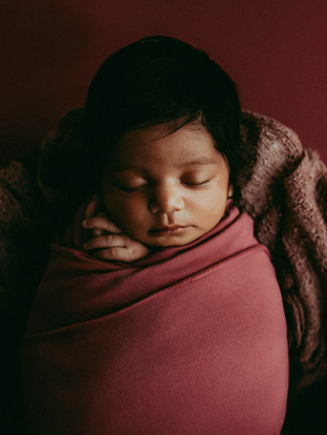 Calgary-newborn-photography-baby-in-plum-wrap