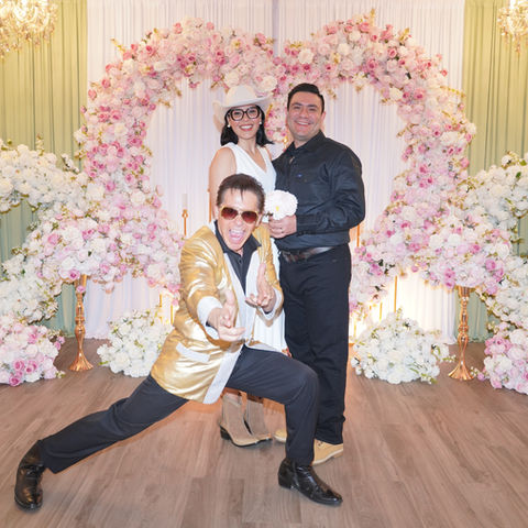 “Elvis vow renewal—couple dancing and laughing at Chapel of Crystals”
