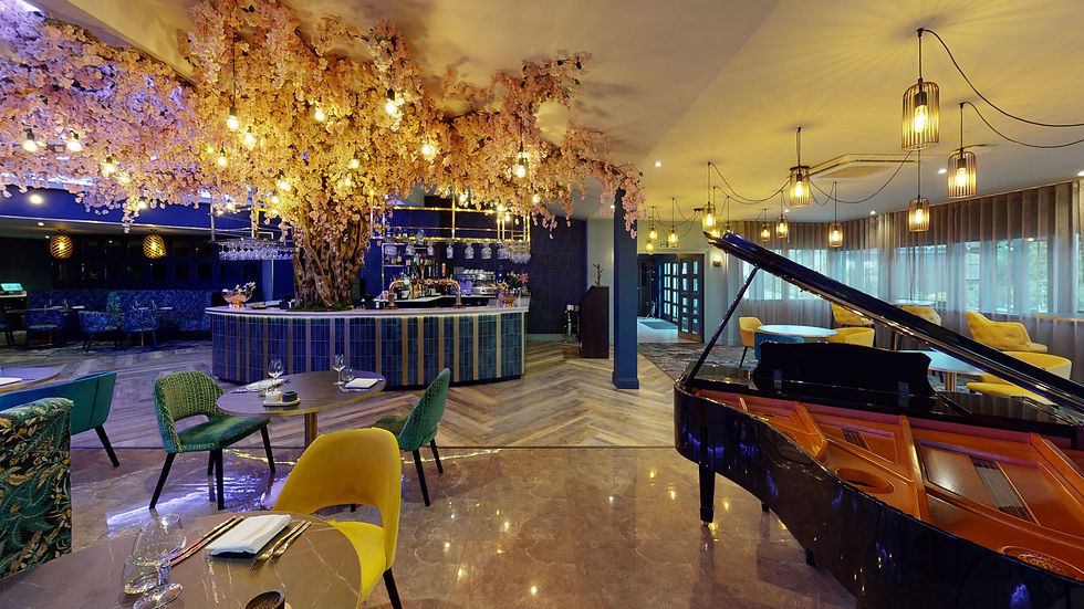 Blossoms restaurant at Rutland Hall Hotel with piano in Leicesterhshire
