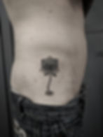 blackwork lotus flower traditional black tattoo