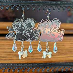 Etched Cherubs & Small Teeth