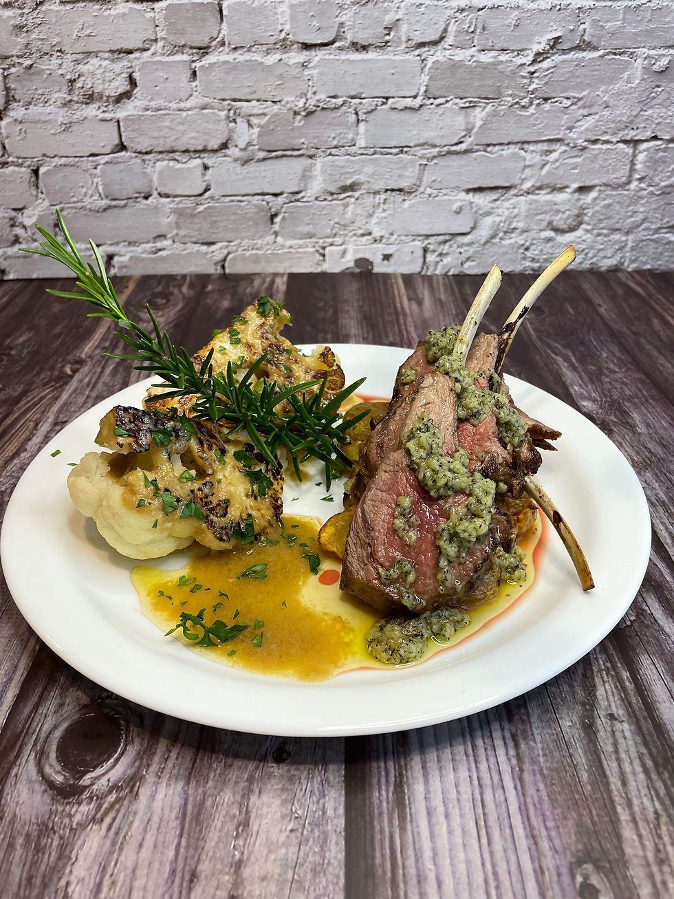 rack of lamb scottadito with roasted garlic & mint sauce, smashed crunchy fingerling potato