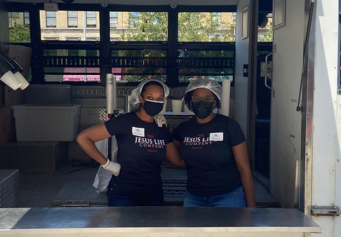 Team serving soul and bread in Harlem