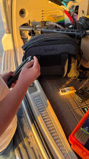 boy with Vertx range bag