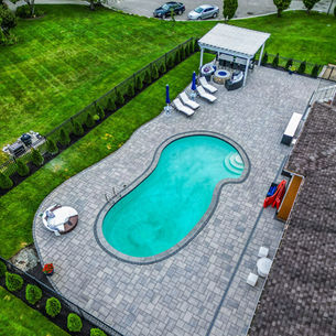 Techo-Bloc paver pool deck and pergola at Serenity Circle in Lynnfield