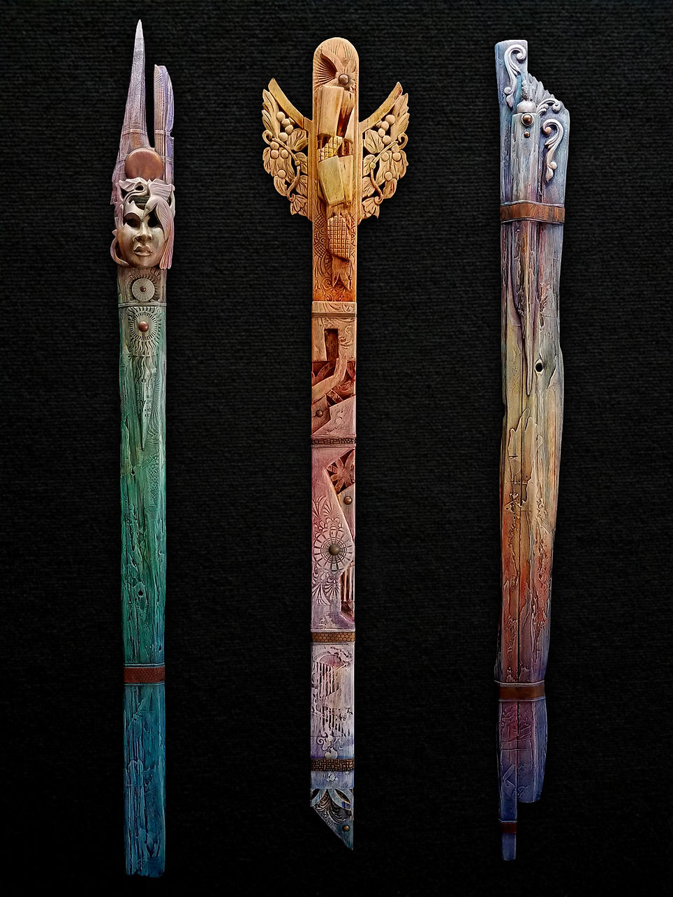 Totem Grouping 1 Left: Morning Song Mixed Media ~ Acrylic, and Copper on Wood 75”H x 5.5”W x 3.5”D  Center: Morning Flight  Mixed Media ~ Acrylic, and Copper on Wood 64”H x 11.5”W x 2.5”D  Right: Ancestral Songs Mixed Media ~ Acrylic, and Copper on Wood 72”H x 6”w x 2”D