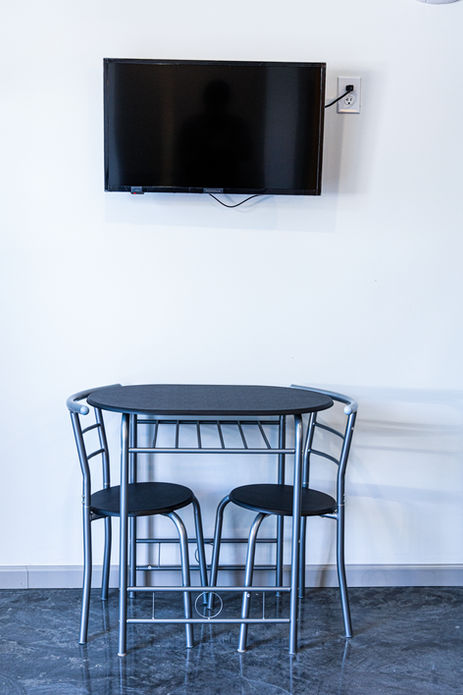 New View Motel Extended Stay Table and TV New Construction