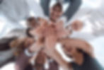 close up. a group of young business people showing their unity..jpg