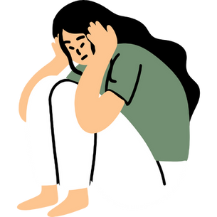 A woman sitting on the floor stressed