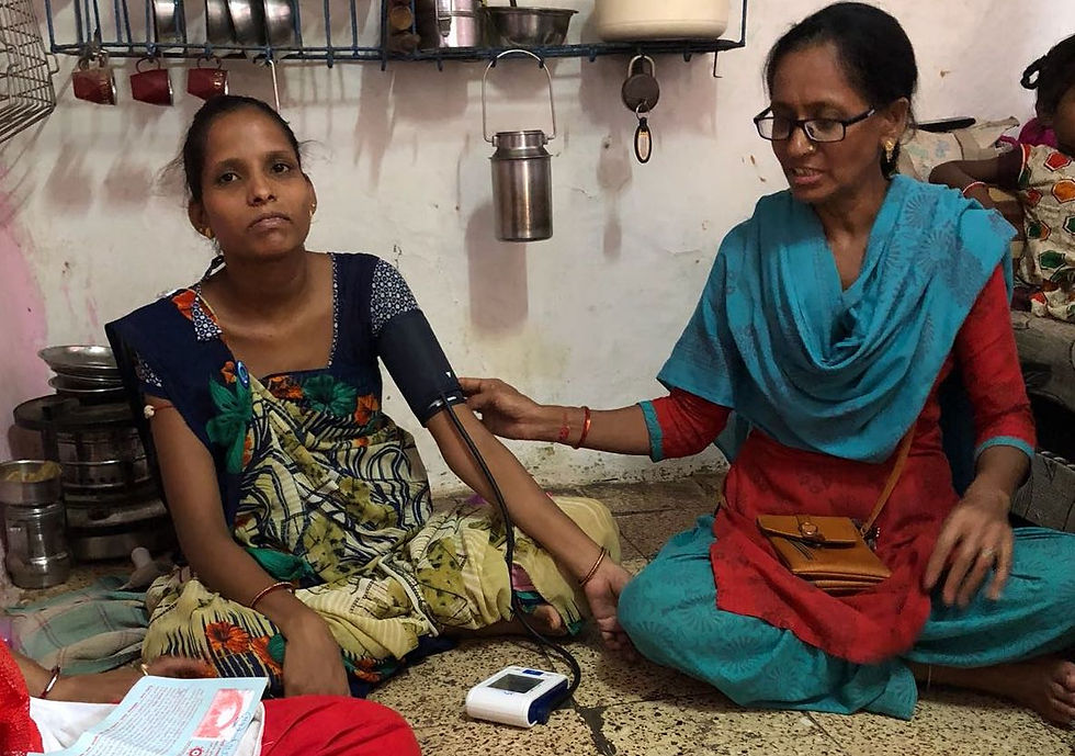 Yoginiben with a patient