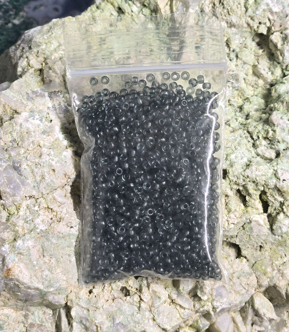 12.5 grams 11/0 dark gray transparent seed beads