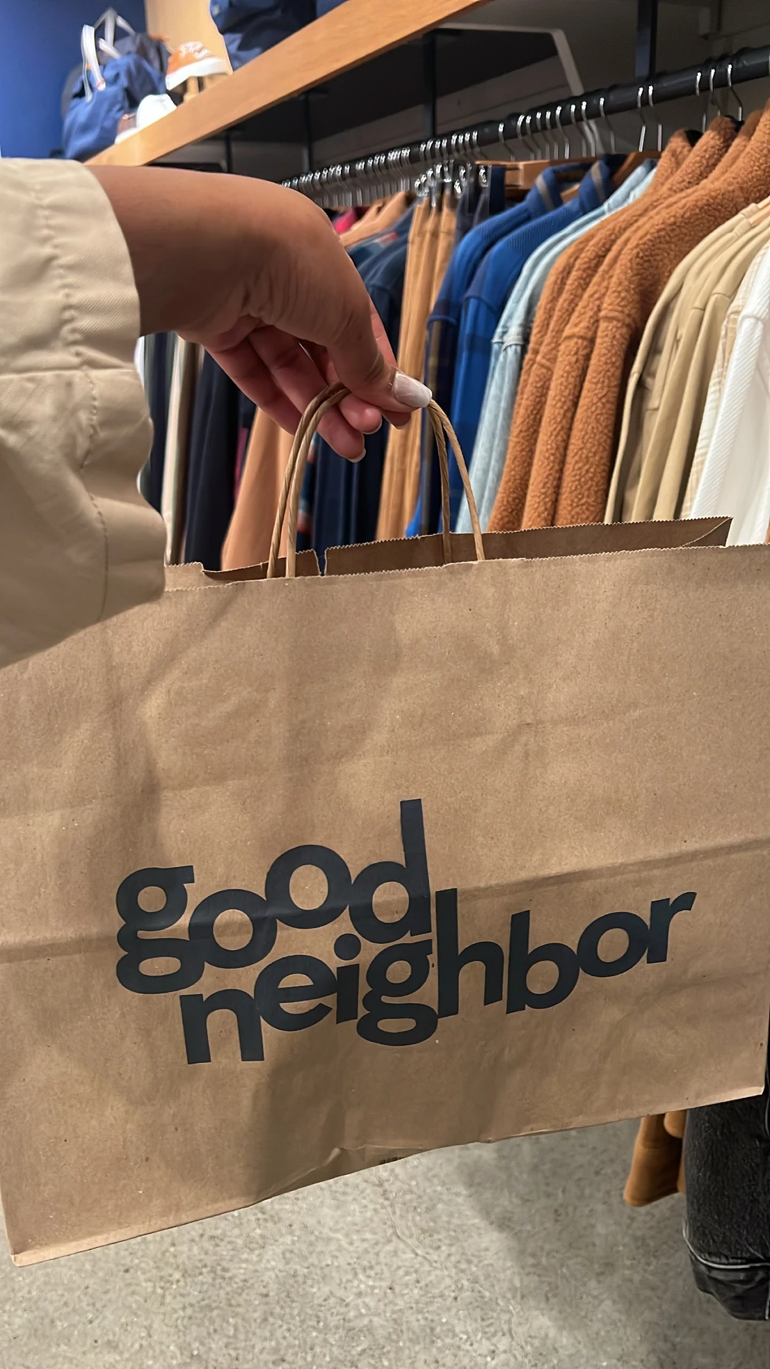 Good Neighbor fall collection: denim, fur, knit, totes, hand bags, leather with Good Neighbor shopping bag
