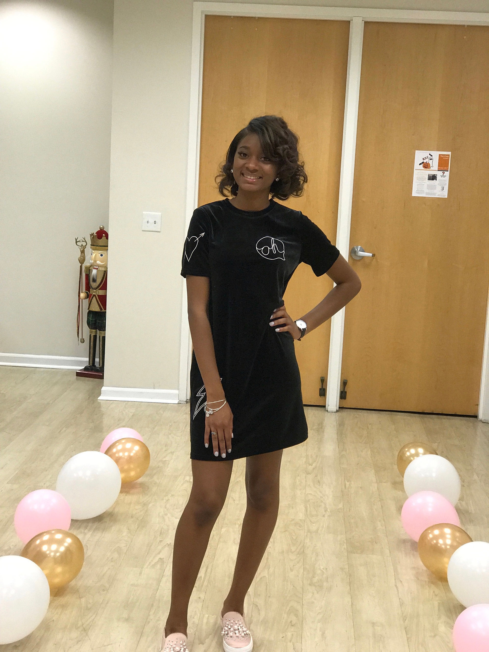 Starr in the middle of her runway for the Select Styles by Starr launch