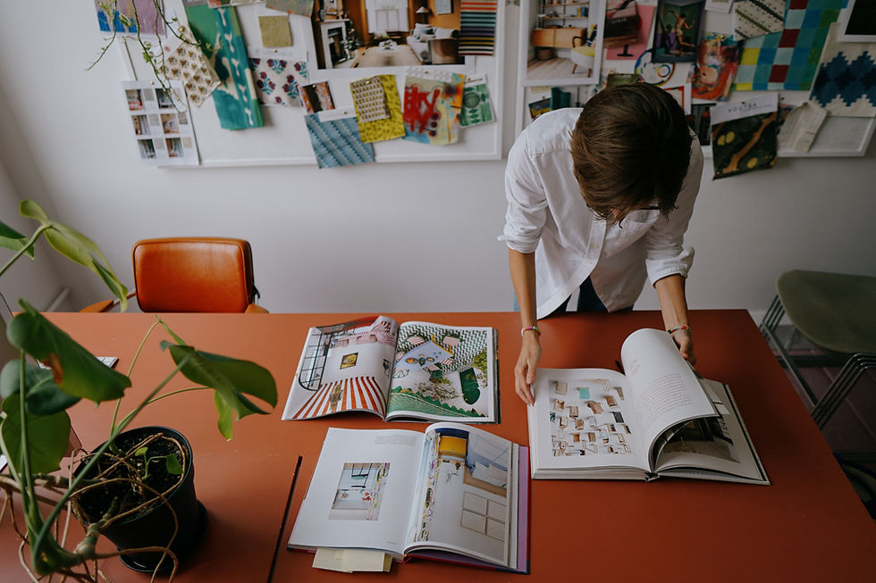 Interior designer and founder Leo Wood from Kinder Design working in her studio, behind the scenes of the design process