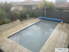 Cloudy swimming pool in a suburban Perth backyard during winter showing hazy water that needs professional pool maintenance.