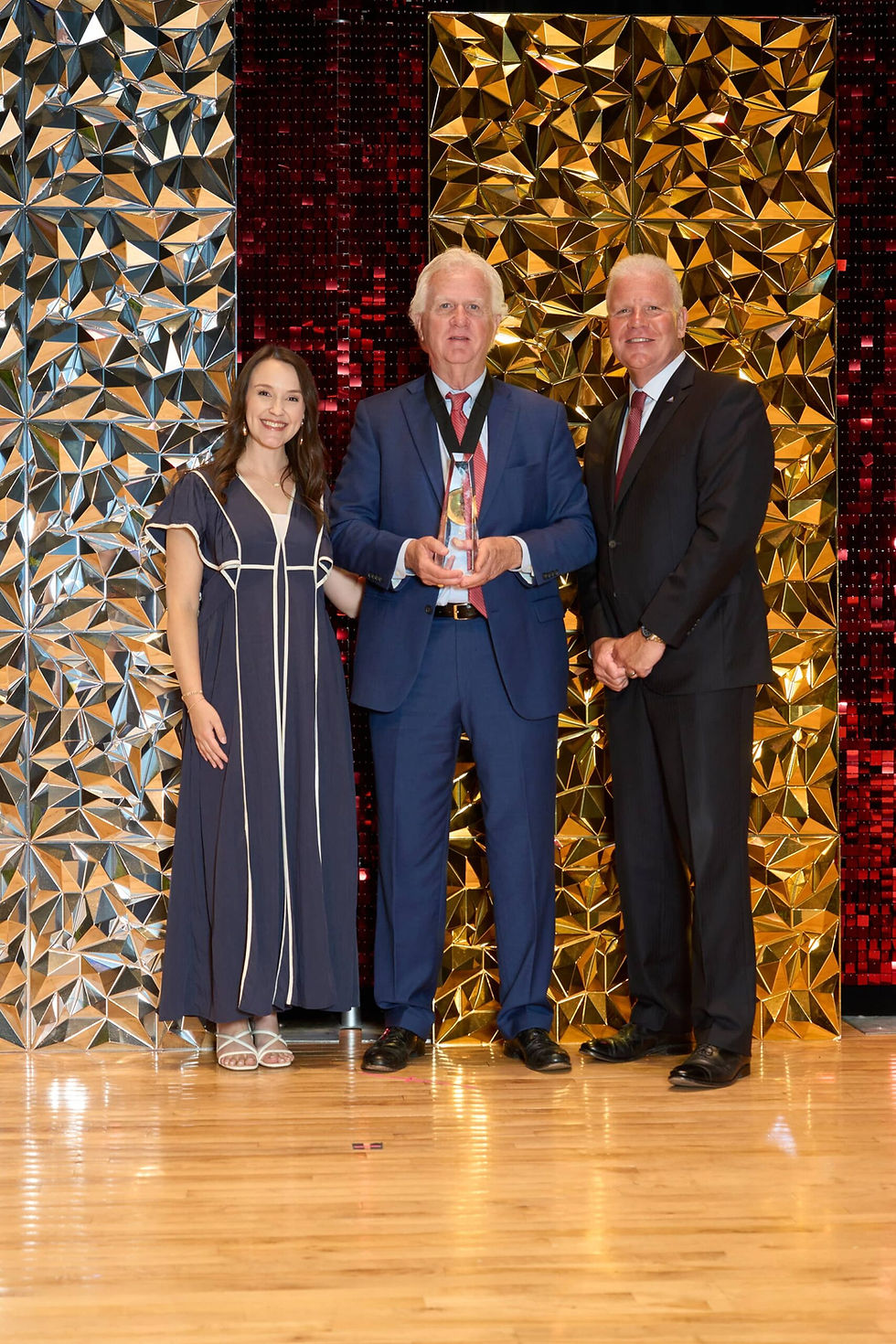 Christina Ross, Vice Chair of Dothan Area Young Professionals; Alan Clark; Jeff Williams, Chairman of the Dothan Area Chamber of Commerce | DSI Team