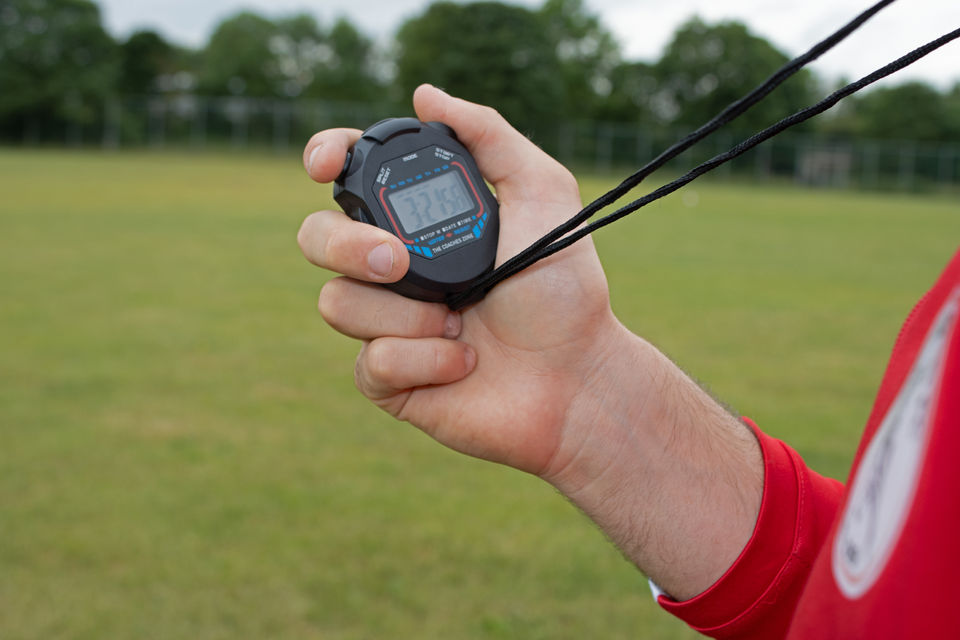 Photo of the C41 Stopwatch being held, showcasing its design and functionality for precise timing during sports coaching.