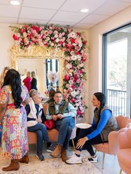 Family of birthday girl relaxing at glam party
