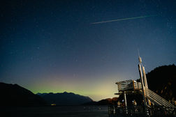 Northern light with meteor star