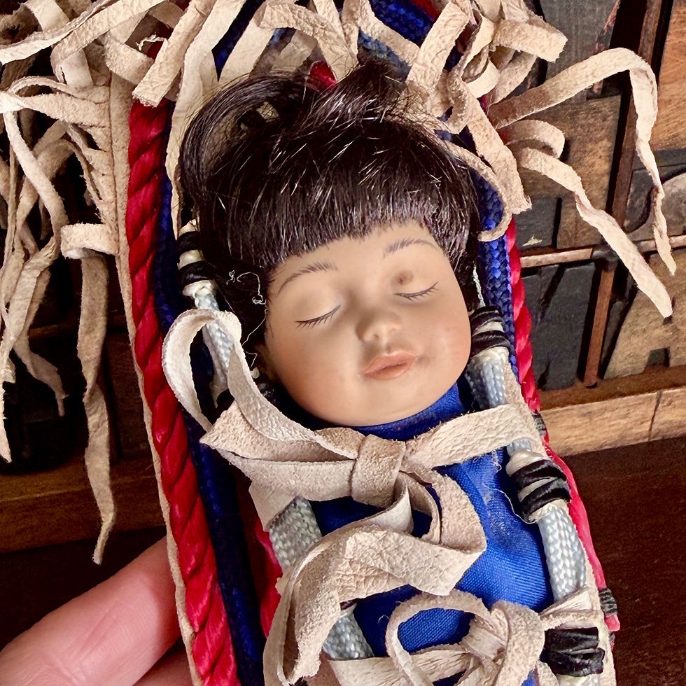 Thumbnail: Vintage Native American moccasin shoe with baby doll