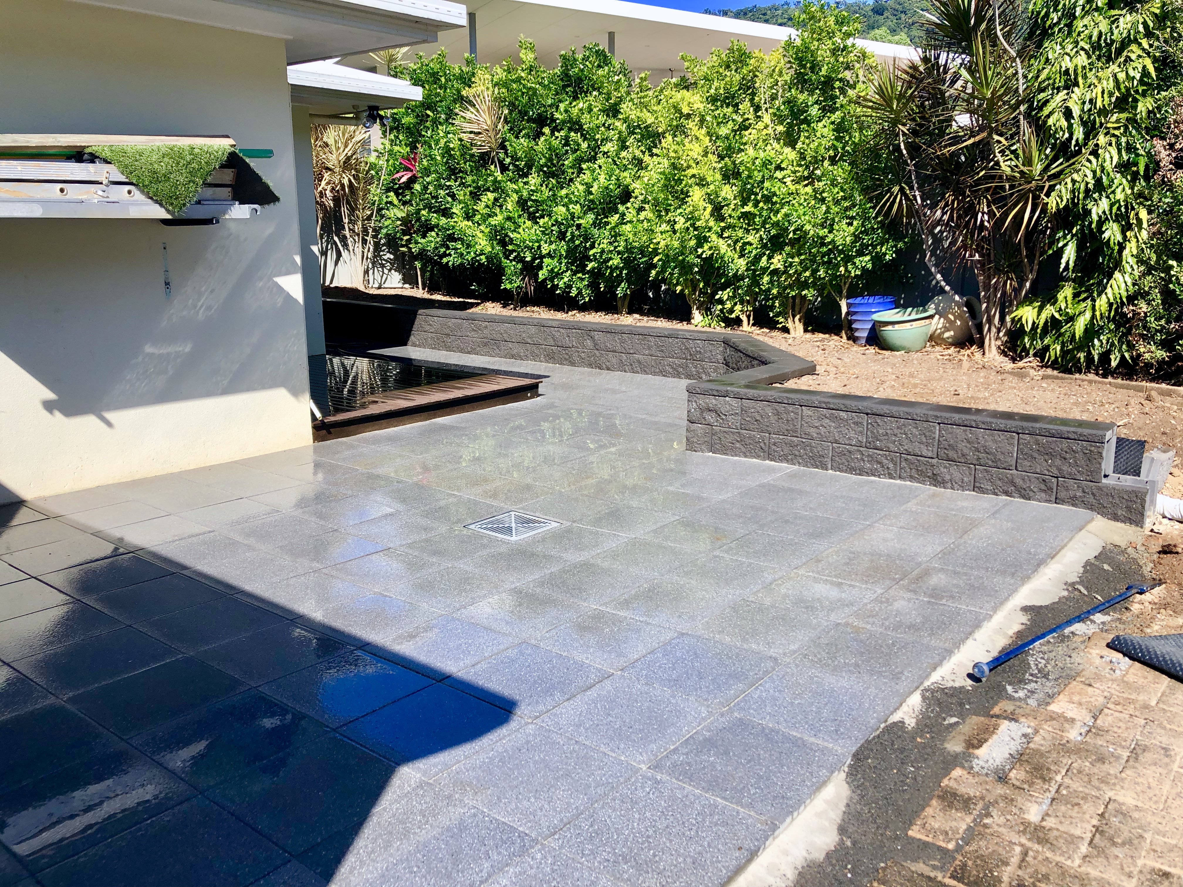 Retaining wall and paving