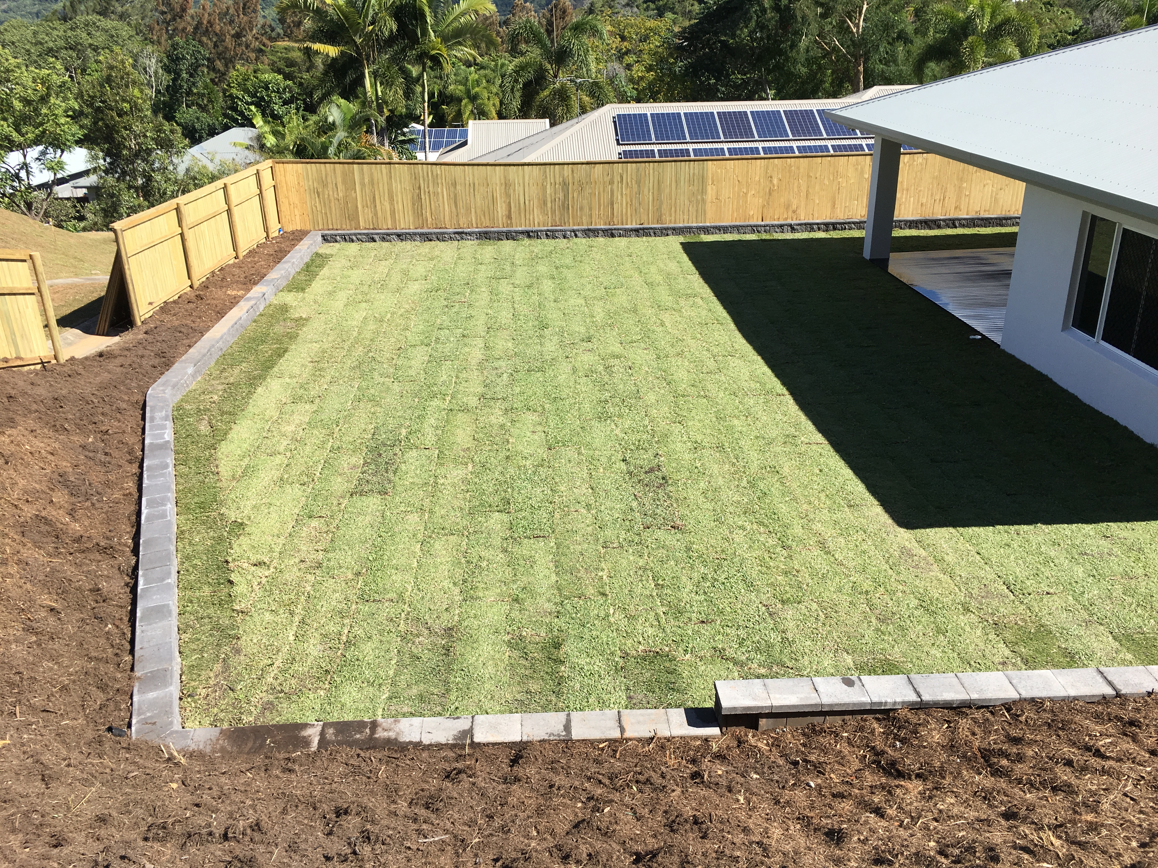 Retaining walls, mulch & turf