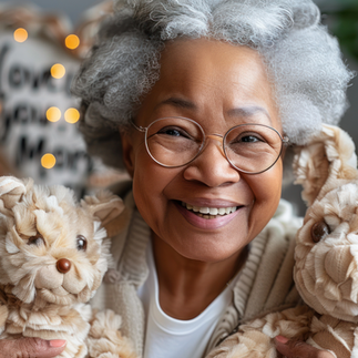 Gifts for seniors. Senion holding stuffed animals.