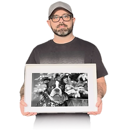 Artist holding medium fine art print size: Medium (A3), printed on satin Baryta paper and mounted.