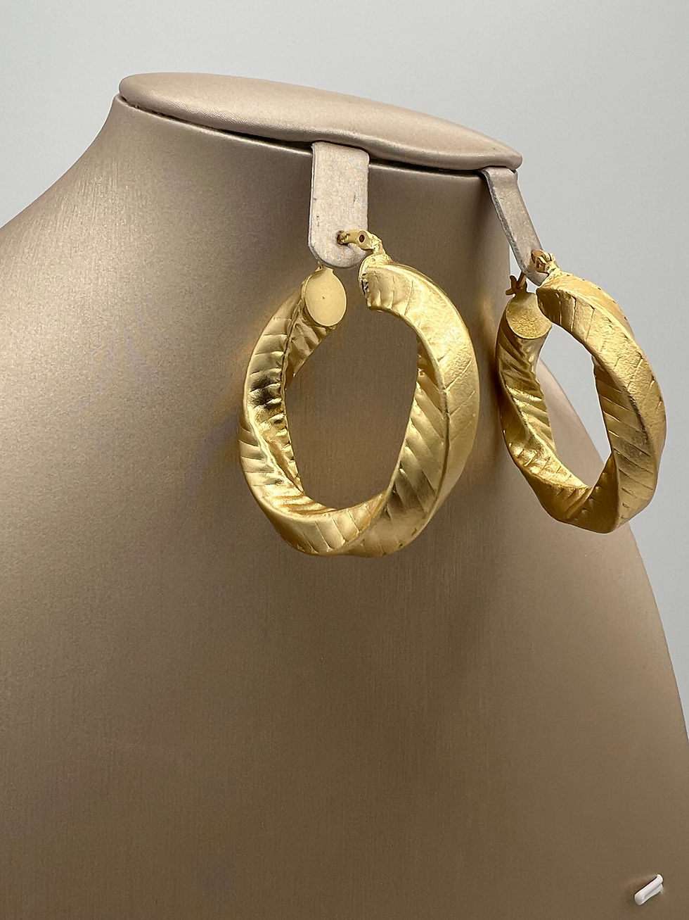 Thumbnail: Golden Twist Luxe Hoop Earrings Non-Tarnish Gold Plated