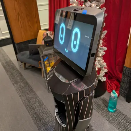 Nova greeting robot side