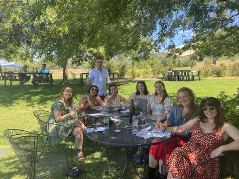 Enjoying the shady tree while wine tasting.