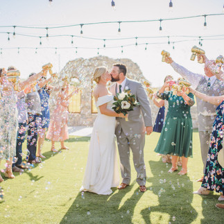 Afternoon send off with bubbles at cocktail wedding reception in Fredericksburg Texas