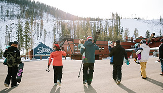 Skiers in Parking Lot