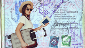 Woman in sunglasses and hat holding a suitcase and passport against a backdrop of colorful passport stamps, smiling cheerfully.